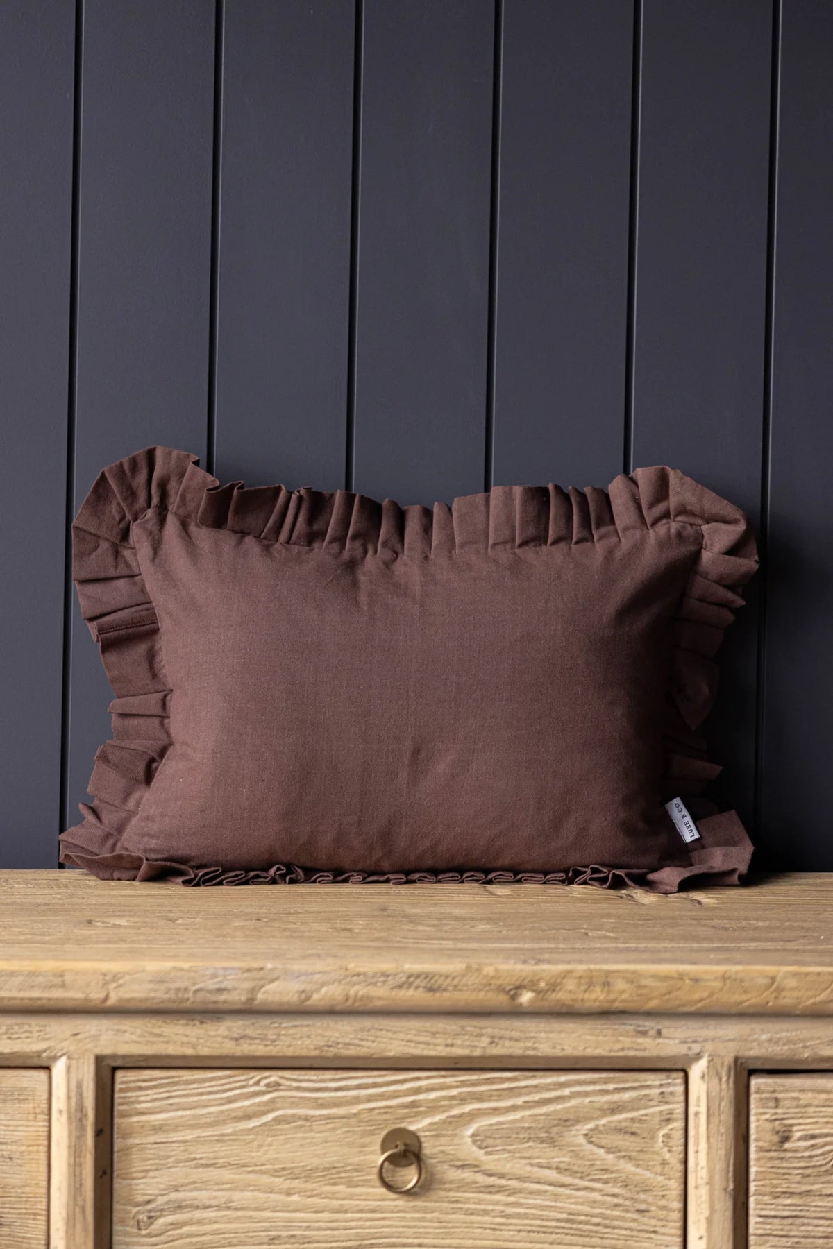 BROWN RUFFLE LUMBAR PILLOW